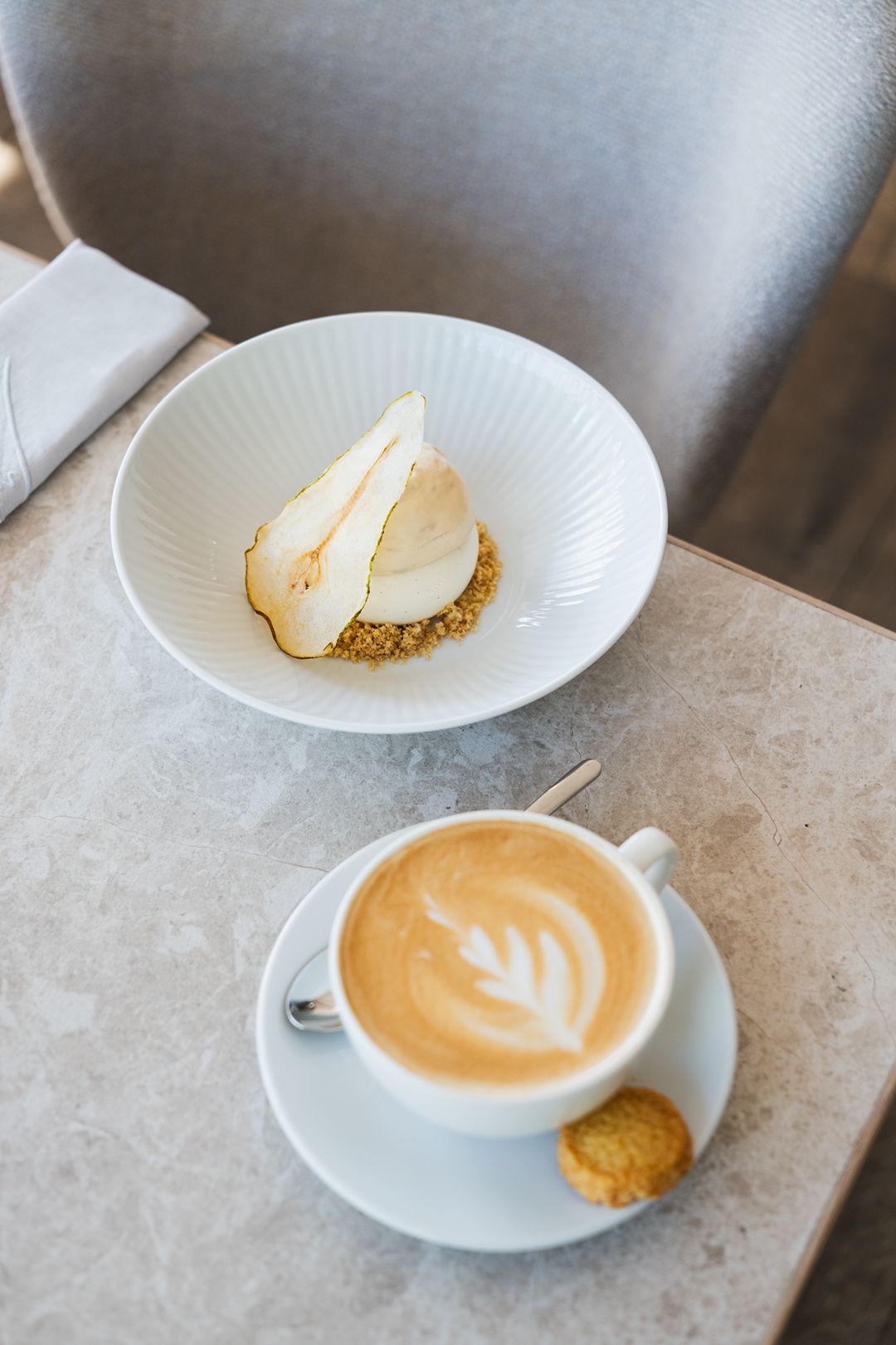 Conference pear dessert with cardamom and a cup of coffee, Przystań & Marina